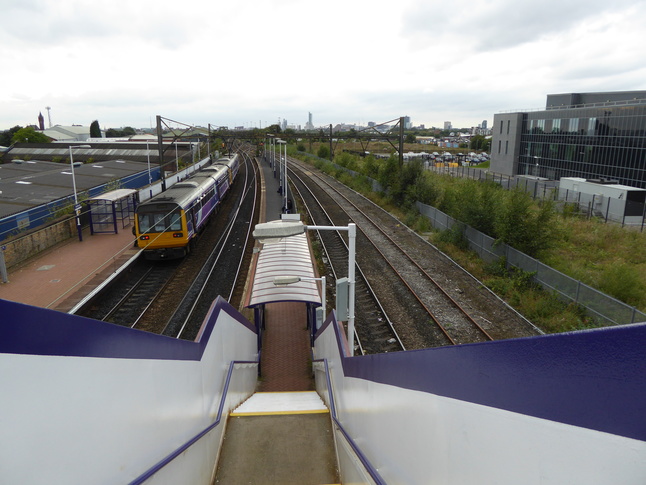 Ashburys platform 2 footbridge exit steps