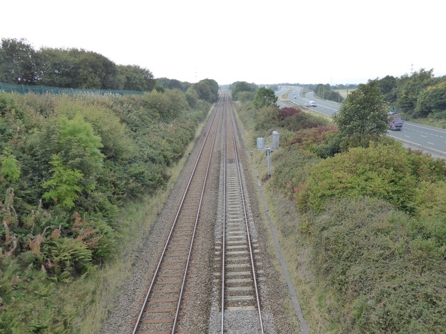 Hapton from footbridge looking west
