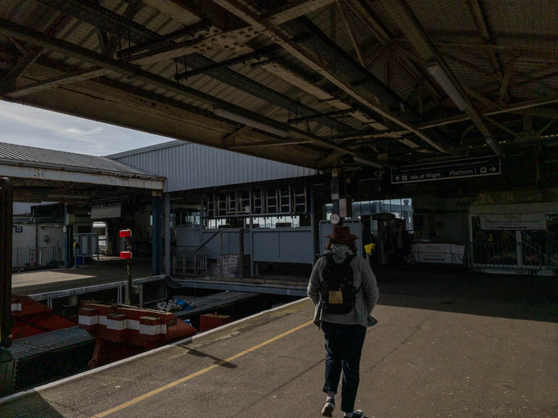 The buffers at the end of
  platform 3, with the Wightlink ferry facilities ahead, platforms 4
  and 5 to the left, and platform 1 and the station exit to the
  right