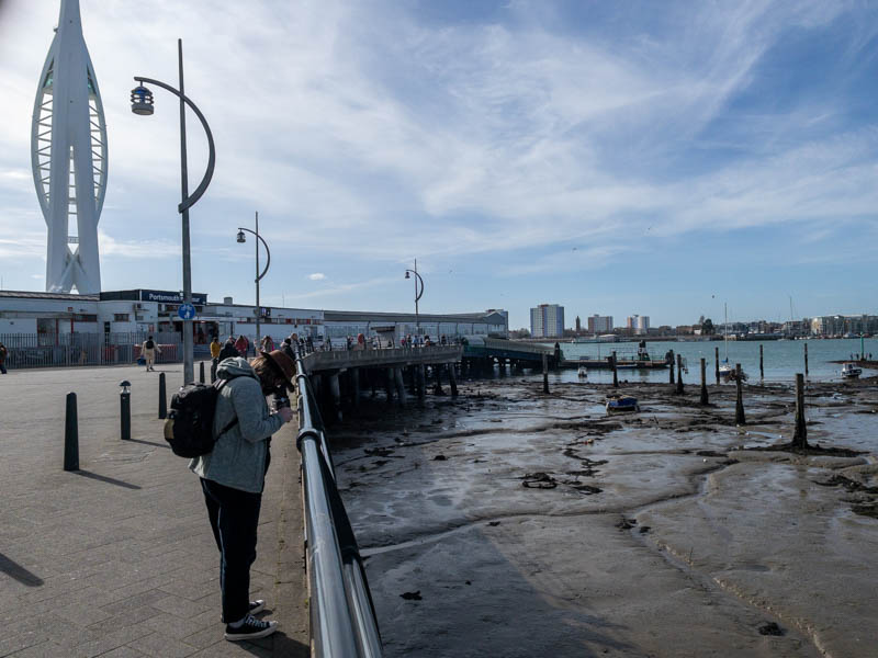 A long view of the station building, showing the station building as it extends over the water.