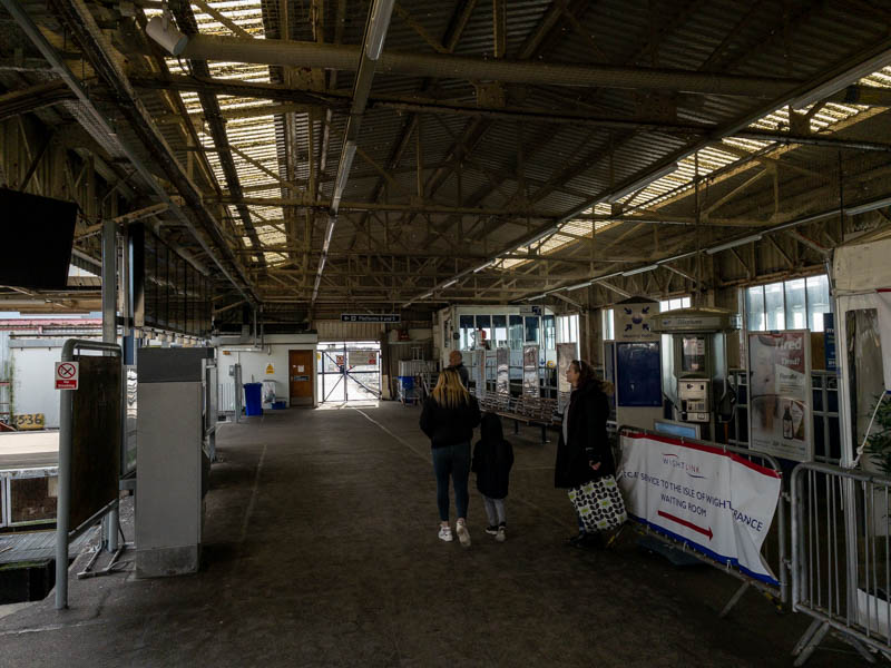 Looking
            south along the ends of platforms 3, 4, and 5.  The
            Wightlink ferry facilities are to the right.