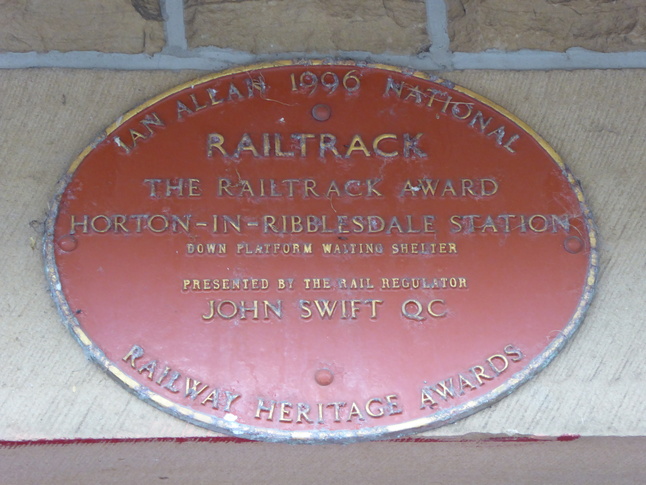 Horton-in-Ribblesdale platform 2 plaque / Ian Allan 1996 National Railway Heritage Awards / Railtrack / The Railtrack Award / Horton-in-Ribblesdale station Down Platform Waiting Shelter Presented by the Rail Regulator John Swift QC
