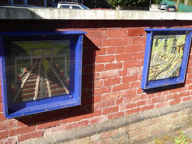 Ceramic artwork tiles on platform 2