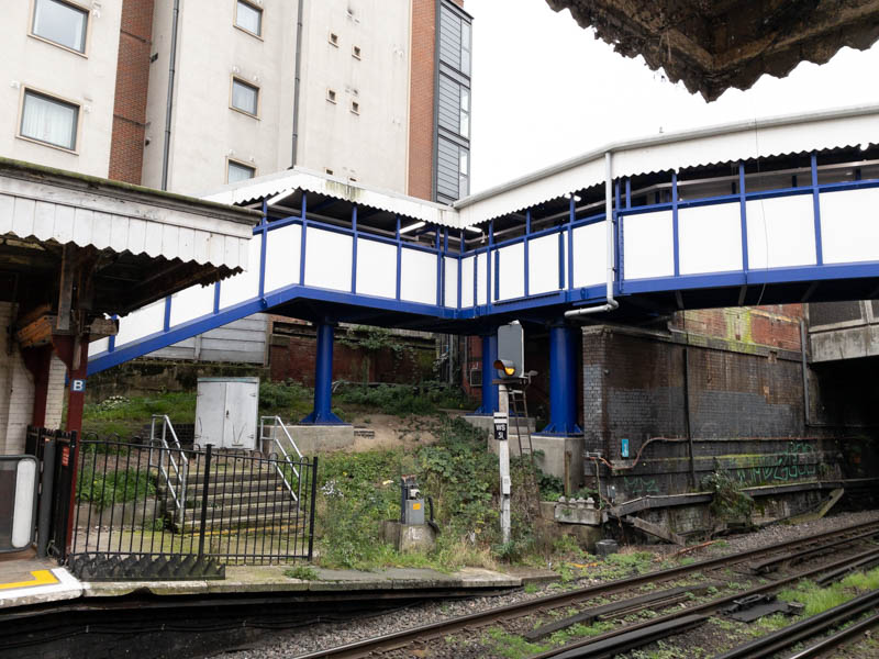 The footbridge, seen from the northern end of the up platform, connecting to the station building just behind,