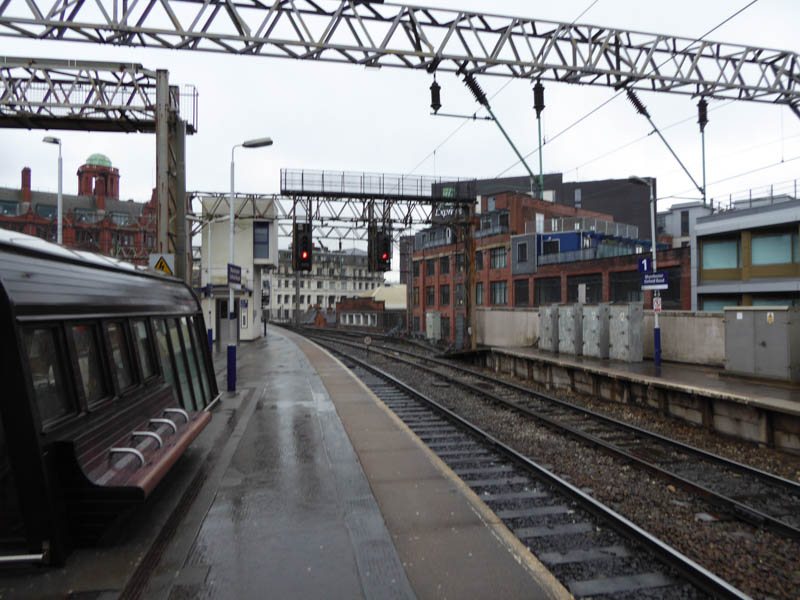 Looking east past the wooden shelter on platform 2