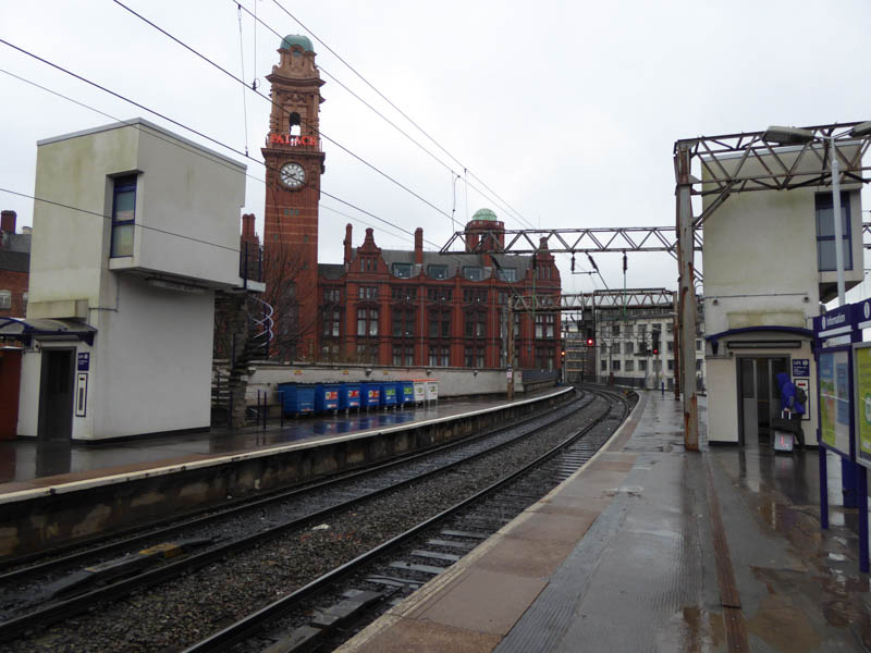 Looking east along the line, with the lifts to a subway visible.
