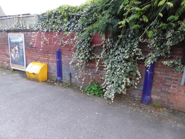 Urmston metal posts embedded in the wall