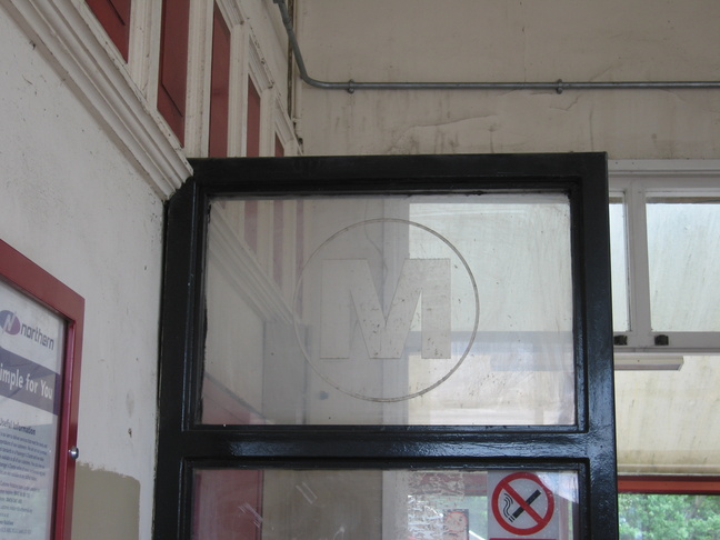 Batley Metro logo frosted glass