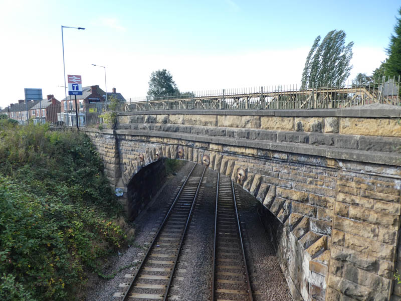 Looking west from the footbridge at the road bridge