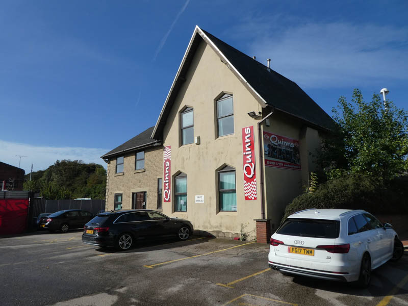 The rear of the old station master's house, now home to a car transport company