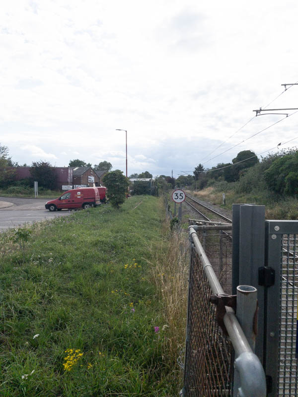 Looking south along the line from the end of the platform