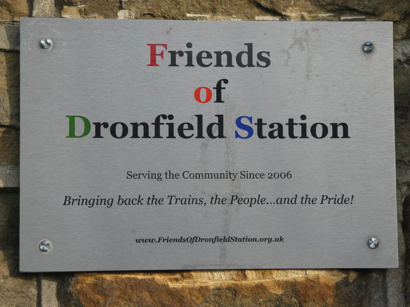 A plaque advertising The Friends of Dronfield Station, serving the Community Since 2006.
