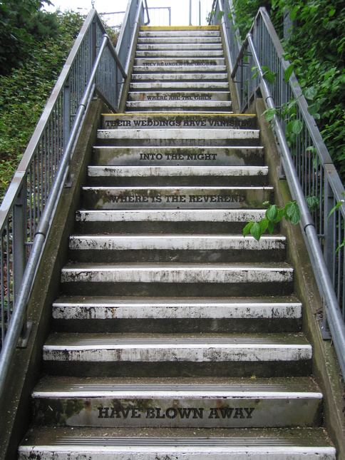 Halewood platform 1 steps - THEY'RE
UNDER THE GROUND / WHERE ARE THE GIRLS / THEIR WEDDINGS HAVE VANISHED
/ INTO THE NIGHT / WHERE IS THE REVEREND / HAVE BLOWN AWAY