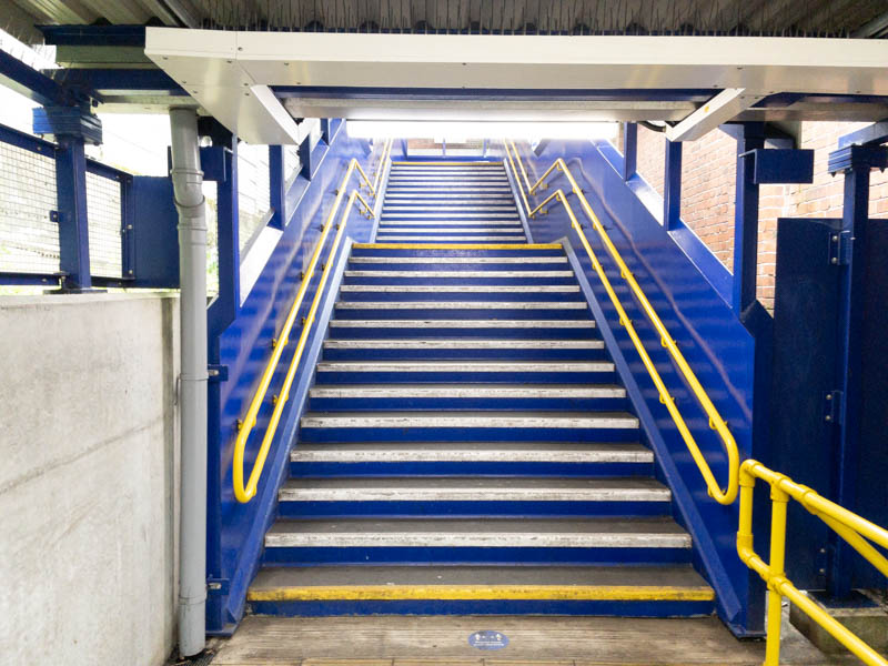 Steps up from platform 2 to street level.  No accessibility here, sad to say.