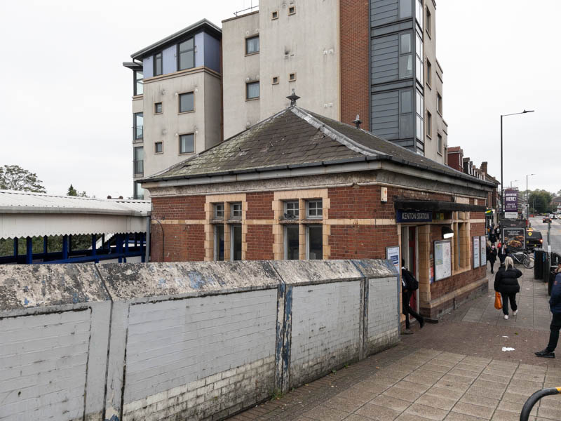 The front of the station building, on the south side of the road over the west coast main line