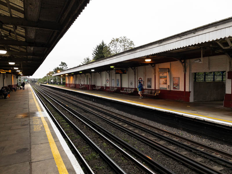 Looking south along both platforms from the northern end of the up platform.  The opening on the right is where the down platform connects to the footbridge.