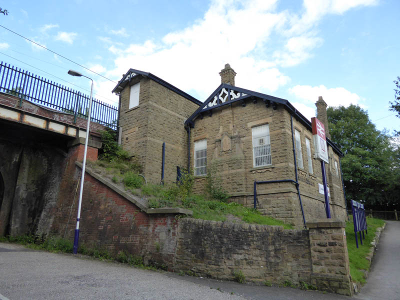 The buildings on the platform 1 side of the station, looking up from the Sheffield Road underpass