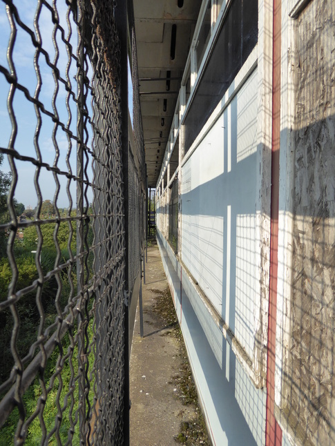 Burnage platform 1 behind fence