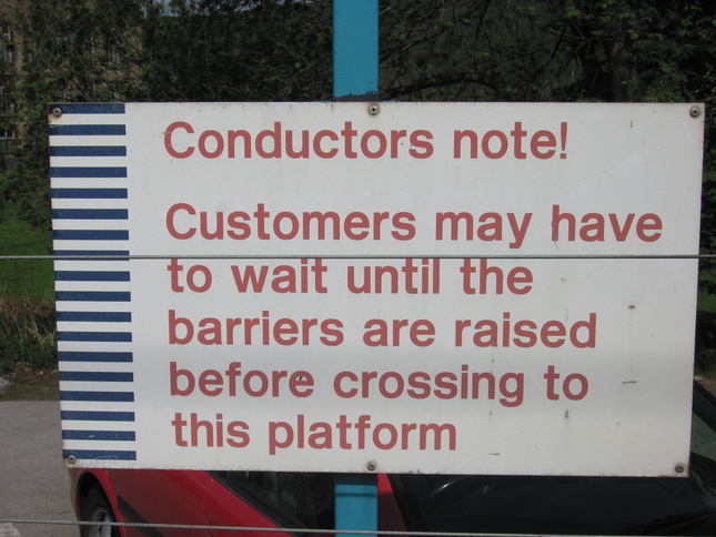 Conductors note!  Customers may have
to wait until the barriers are raised before crossing to this
platform