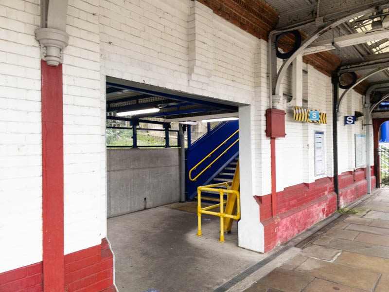 The exit from platform 2 to the footbridge and station building